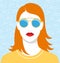 Beautiful redhead woman with golden sunglasses