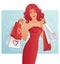 Beautiful redhead woman with shopping bags