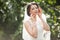 beautiful refined stylish elegant beautiful bride on the background spring garden