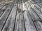 Beautiful reflecting diagonal stripes onto wood floor with sunlight.