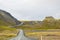 Beautiful Reflection of Houses, Church, Highway and Rainbow Road in Seydisfjordur Town in Iceland in August