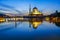 Beautiful reflection of Putra Mosque in the lake during blue hour.