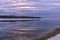 Beautiful reflection of the sky at sunset in the water on the river. Spring background