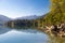 Beautiful reflections of forested Birkenhead lake shoreline and mountains