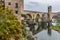Beautiful reflections of the medieval bridge Besalu, Spain.