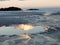 Beautiful reflections in water on the beach where the tide has receded