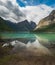 A beautiful reflective view of Kenny Lake in Mt Robson Provincial Park in British Columbia Canada