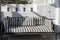 Beautiful relax terrace with gray white striped sofa, Santorini