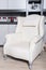 Beautiful renoveted armchair in champagne colored leather