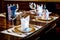 A Beautiful restaurant table setting with porcelain china, silverware cutlery and napkin and glassware