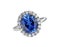 Beautiful ring with blue gem (stone) isolated on white