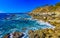 Beautiful rocks cliffs view waves at beach Puerto Escondido Mexico