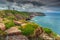 Beautiful rocky coastline with lighthouse at famous Cap Frehel,France