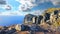 Beautiful rocky mountains and blue sea with blue sky.