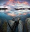 Beautiful rocky shoreline at Uttakleiv Beach in morning, Vestvagoy, Lofoten Islands archipelago, Norway.