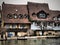 Beautiful romantic houses by the river with tree and romantic house in the background