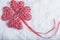Beautiful romantic vintage red hearts together on a white snow background. Love and St. Valentines Day concept.