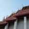 Beautiful roofs of a Buddhist temple. Architectural art of southeast asia