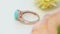 Beautiful Rose Gold Solitair Blue Topaz Ring paved with stones