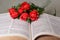 Beautiful roses on a large Bible