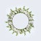 Beautiful round circle floral frame or wreath layout with green flowers on white background