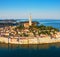 Beautiful Rovinj at sunrise. Morning aerial photo. The old town of Rovinj, Istria, Croatia