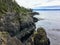 The beautiful rugged coastline of the famous east sooke coast trail along the rocky shores of southern Vancouver island