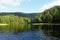 The beautiful rugged landscape of gwaii haanas, with endless forest and mountains, and beautiful calm oceans, in Haida Gwaii