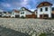 Beautiful rural whitewashed houses in row, Rimetea, Transylvania, Romania