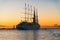 Beautiful sailship going to sunset