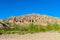 Beautiful sand mountains above green forest