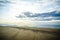 Beautiful sand ripples and waves along the pristine beach at Cape Cod National Seashore at dusk