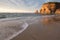 Beautiful sandy beach on atlantic coastline in sunset, hendaye, basque country, france