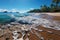 Beautiful sandy beach with rolling turquoise waves