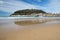 Beautiful sandy beach in san sebastian with monte urgull, spain