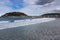 Beautiful sandy beach in san sebastian with monte urgull, spain