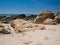 Beautiful sandy beach with sandstone rocks in Portugal in summer