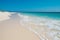 Beautiful sandy beach with white sand and rolling calm wave of turquoise ocean on Sunny AI generated