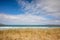 Beautiful Scarista Beach with the Atlantic ocean and hills in the background under a cloudy sky