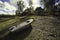 Beautiful scene of a  boat in the middle of the field combined with cloudy sky view