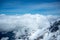 Beautiful scene of clouds and mountains looking from viewpoint at Jungfrau with blue sky