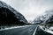 Beautiful scene of empty road to Milford sound after snow. I