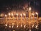 Beautiful scene of lit candles illuminating a church sanctuary