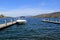 Beautiful scene of long piers and moored boats, Lake George, New York, 2016