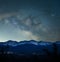 Beautiful scene of vista Starry night sky over the rocky mountains, for wallpaper