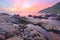 Beautiful scenery of dawning sky by rocky seashore in northern Taiwan (long exposure effect)