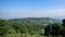 Beautiful scenery with hills in the background under a blue sky