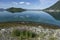 Beautiful scenery of a lake reflecting the beauty of mountains and the sky in Lofoten, Norway