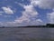 Beautiful scenery overlooking the Karnaphuli river with white clouds floating in the blue sky
