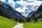 Beautiful scenery of Stiluptal on a sunny day with mountain peaks in the background. Stilluptal, Austria, Tyrol